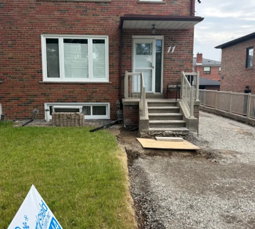 Brick home in Toronto with new brick-to-brick replacement windows installed across the house