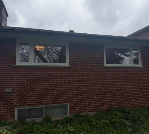 Brick home in Scarborough with new brick-to-brick replacement windows installed