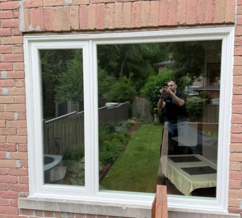 Large picture window replacement on a brick Mississauga home exterior