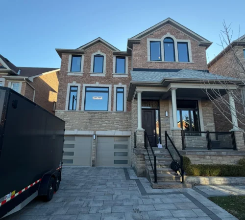 Black Triple-Glass Window and Door Replacement in Vaughan, Ontario - northshield project 11 front townhome window and door project
