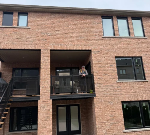 Black Triple-Glass Window and Door Replacement in Vaughan, Ontario - northshield project 11 rear townhome doors and windows exterior