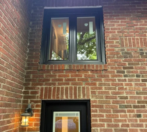 Black Brick-to-Brick Window and Door Replacement Project in Toronto, Ontario - northshield project 12 black door and upper window brick exterior