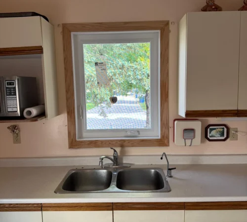 Full-Frame Wood Window Replacement Project in Winnipeg, Manitoba - northshield project 17 kitchen sink window interior