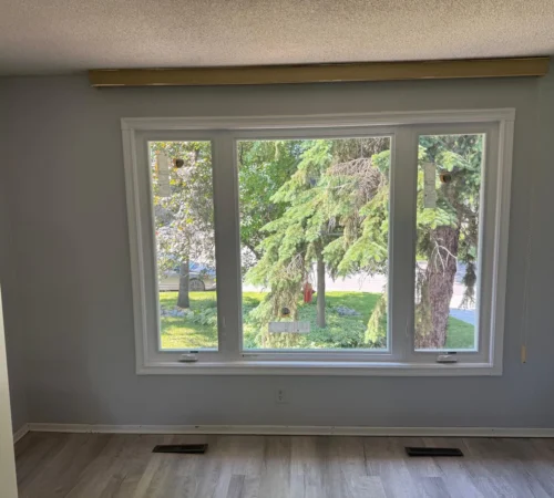 Cold Aluminum Window Replacement Project in Winnipeg, Manitoba - northshield project 19 living room triple window interior