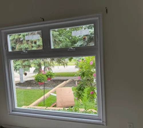 Cold Aluminum Window Replacement Project in Winnipeg, Manitoba - northshield project 19 living room wide window interior
