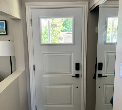 Interior view of the new front door system installed in a Calgary home