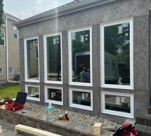 Triple-Glass Full-House Window Replacement Project in Winnipeg, Manitoba - backyard window wall exterior