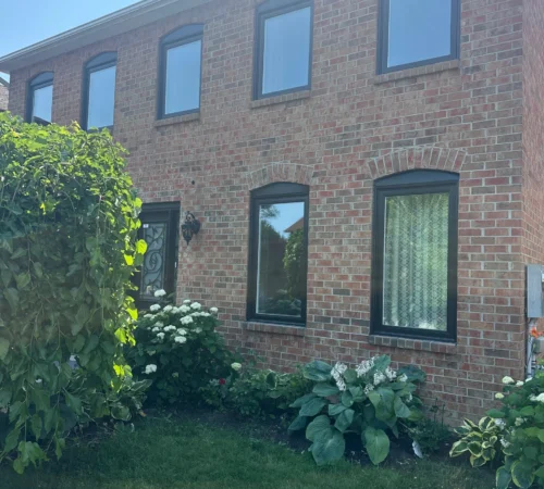 Black Triple-Glass Window Replacement Project in Ajax, Ontario - black window front exterior