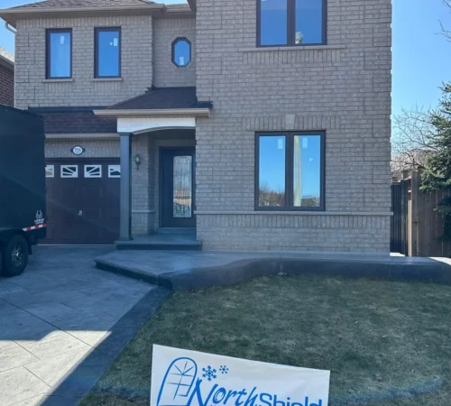 Chocolate Brown Window and Sliding Door Replacement Project in Mississauga, Ontario - black windows front exterior