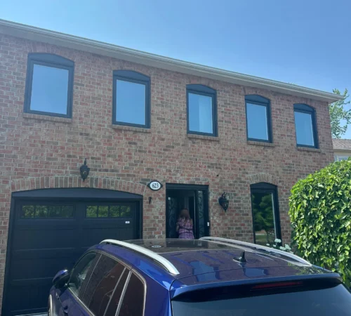 Black Triple-Glass Window Replacement Project in Ajax, Ontario - black windows townhouse exterior