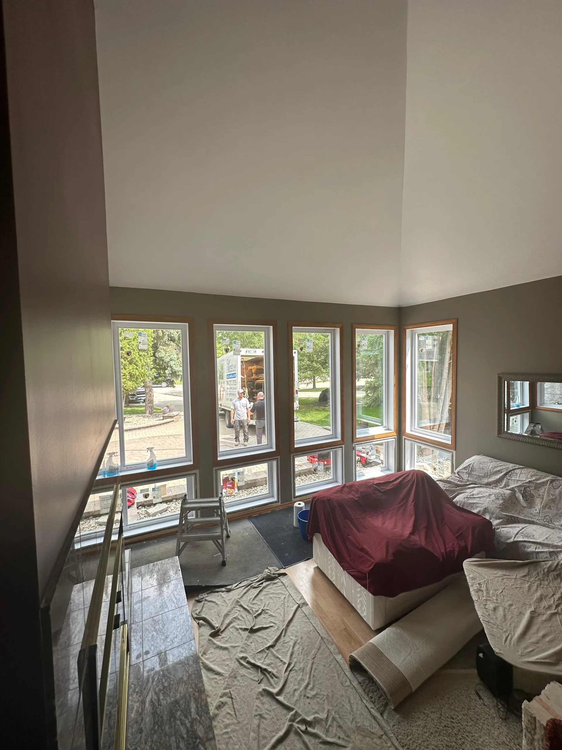 Living room window installation showing how opening size and access affect labour.