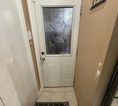 Full-Frame Steel Door Replacement Project in Calgary, Alberta - glass entry door vestibule
