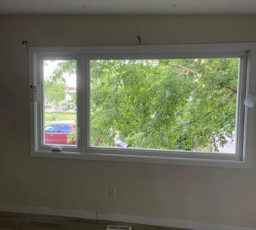 Full-Frame Triple-Glass Window Replacement Project in Calgary, Alberta - living room picture window interior calgary