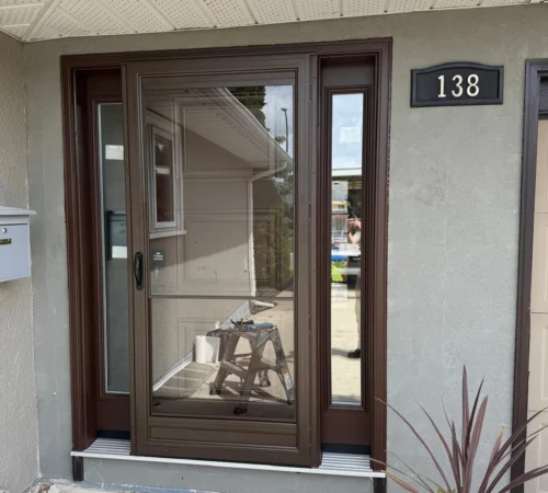 Front Door System Replacement Project in Calgary, Alberta - northshield project 08 before brown front door exterior