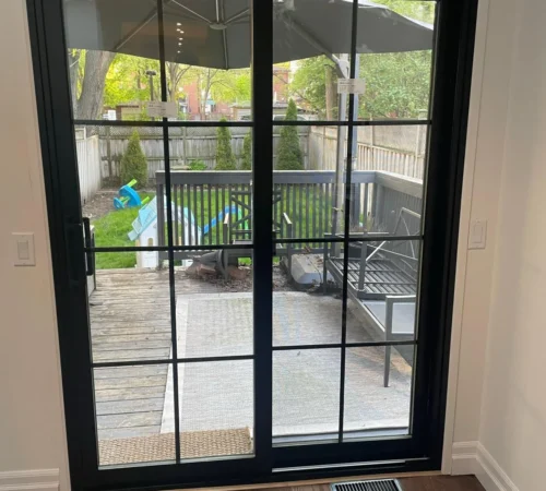 Black Sliding Patio Door Replacement Project in Toronto, Ontario - northshield project 10 black grid patio door interior