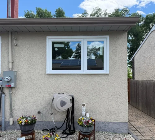 Full-Frame Window and Door Replacement Project in Winnipeg, Manitoba - northshield project 18 rear wall windows and utility meter