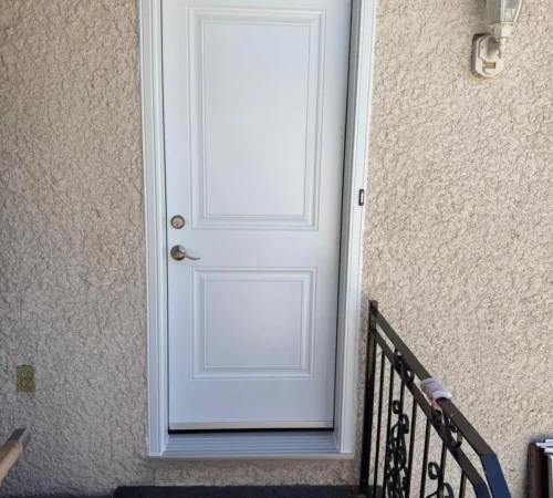 Steel Door Replacement Project in Ajax, Ontario - northshield project 21 white entry door stucco exterior