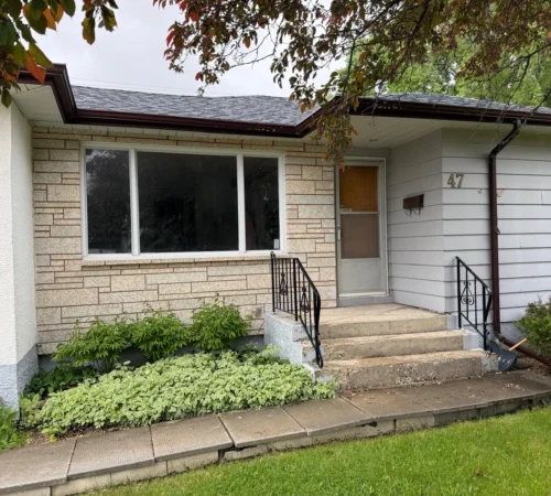 Full-Frame Living Room Window Replacement Project in Winnipeg, Manitoba - northshield project 22 front house picture window exterior