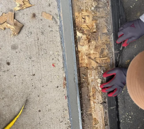 Steel Front Door Replacement Project in Calgary, Alberta - northshield project 23 before rotted door threshold closeup