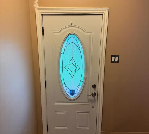 Full-Frame Steel Door Replacement Project in Calgary, Alberta - oval glass entry door interior
