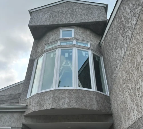 Triple-Glass Full-House Window Replacement Project in Winnipeg, Manitoba - upper bay window exterior