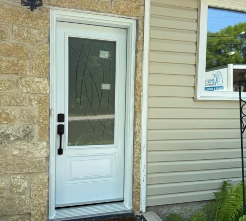 Full-Frame Steel Door Replacement Project in Calgary, Alberta - white storm door front exterior