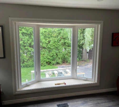 Full-Frame Window and Front Door Replacement Project in Keswick, Ontario - wide window living room interior