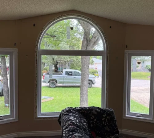 arched window with narrow sidelights