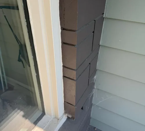 Full-frame window replacement with finished exterior trim detail