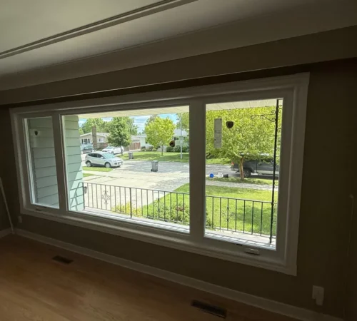 Quarter-half-quarter living room window with casement sides and fixed centre glass