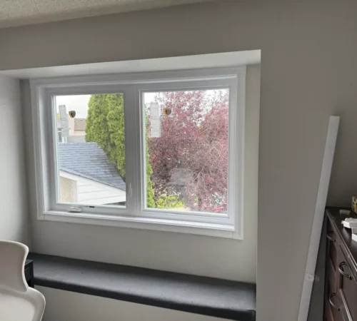 Inside view of a new double window above a bench nook