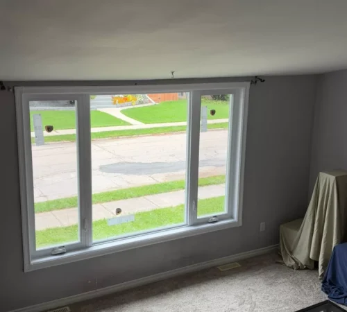 Living room window with a fixed centre pane between two casements